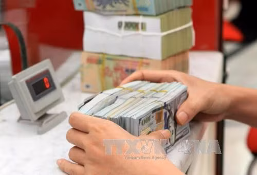 Central bank to change reserve requirement policy ảnh 1