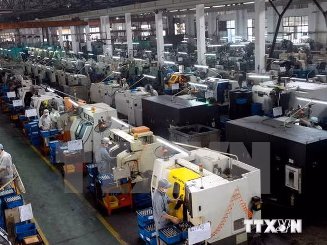 Industrial production index rises 7.3 percent in first four months ảnh 1