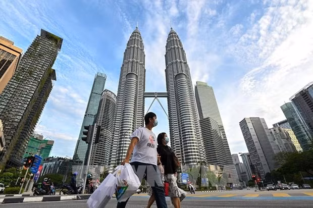 Malaysia’s 2024 economic outlook positive: experts ảnh 1