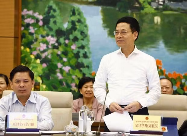 MIC leader answers deputies’ questions at NASC’s 36th session ảnh 1