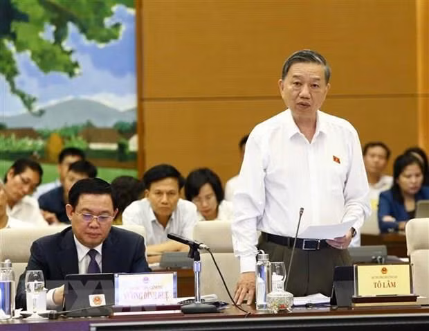 Public security minister fields questions relating ‘black credit’ issue ảnh 1