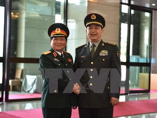 Vietnam, China agree to deepen defence ties ảnh 1