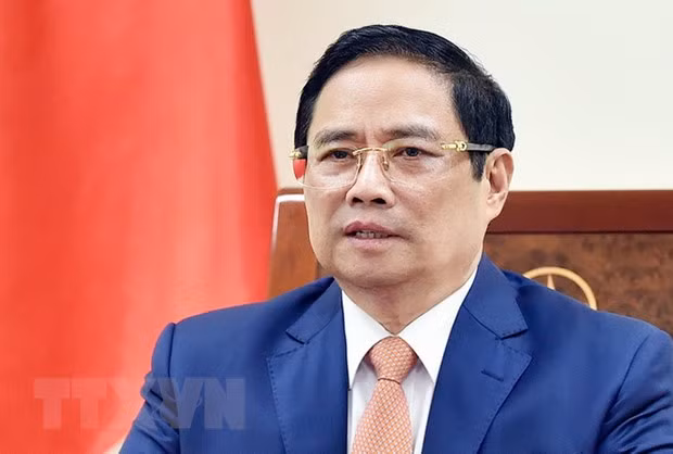  PM Pham Minh Chinh holds phone talks with Indian counterpart ảnh 1