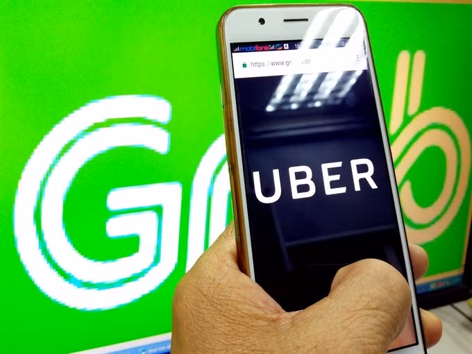 Local ride-hailing apps struggle to compete with Grab ảnh 1