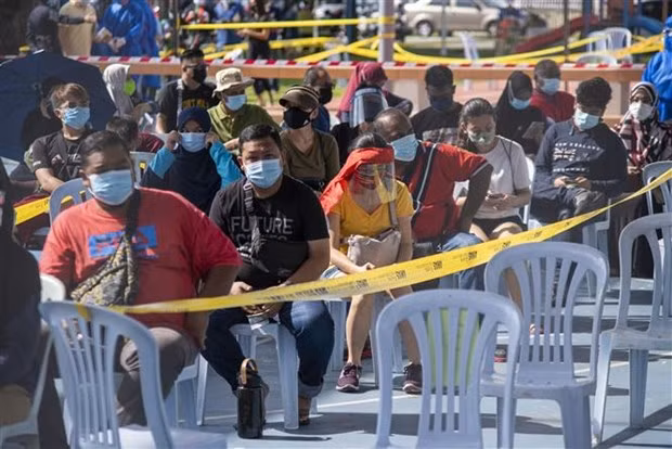 COVID-19: Malaysia worries about sporadic cases, Cambodia logs higher death toll ảnh 1