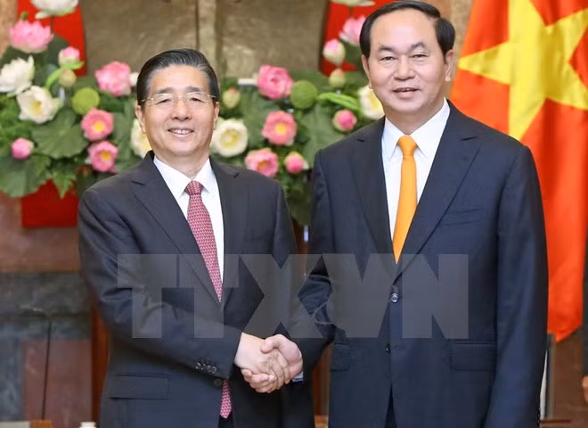 President hails new cooperation deals with Chinese ministry ảnh 1
