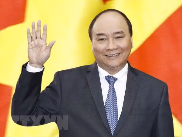 PM Nguyen Xuan Phuc to visit Singapore, attend ASEAN Summit ảnh 1