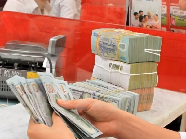 Reference exchange rate down 5 VND on August 27 ảnh 1
