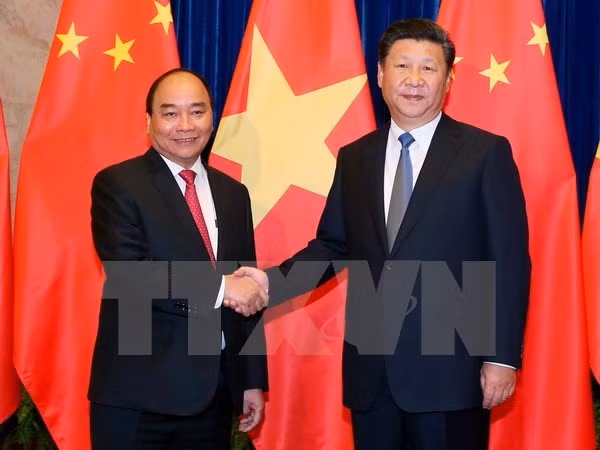 PM’s China visit gives new impetus to bilateral ties ảnh 1