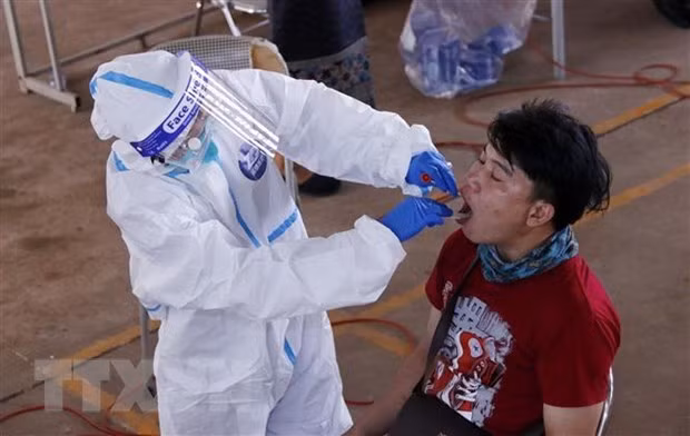 Laos sees new daily record of COVID-19 cases ảnh 1