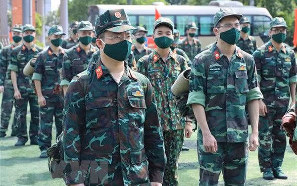 Programme pays tribute to frontline forces in COVID-19 fight ảnh 1