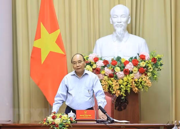 President hails garment sector for growth amid COVID-19 pandemic ảnh 1 President hails garment sector for growth amid COVID-19 pandemic ảnh 1