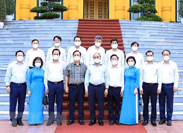 President hails garment sector for growth amid COVID-19 pandemic ảnh 3 President hails garment sector for growth amid COVID-19 pandemic ảnh 3