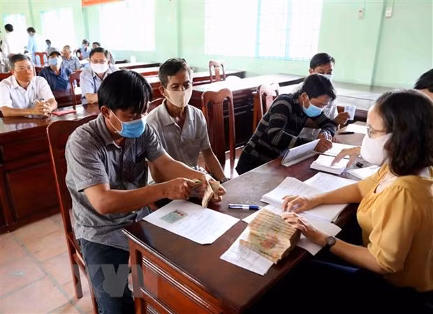 Workers to be required to pay deposit in order to work in RoK ảnh 1