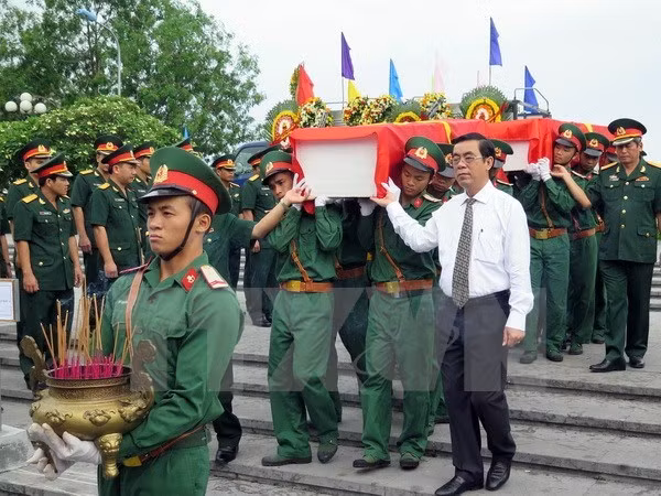 Ha Tinh reburies Vietnamese martyrs repatriated from Laos ảnh 1 Ha Tinh reburies Vietnamese martyrs repatriated from Laos ảnh 1