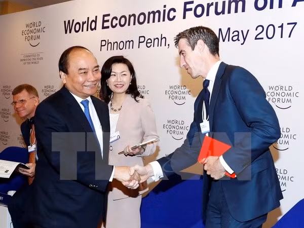 Prime Minister wraps up activities at WEF-ASEAN 2017 ảnh 1